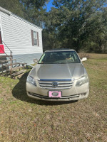 2005 Toyota Avalon with 106,000 miles, featuring a V6 engine and detailed interior in good condition.