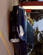 2006 Chevy Monte Carlo in good condition, featuring a V6 engine and new brakes, parked in a lot.