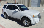 2012 Ford Escape Limited in white with low mileage, clean leather interior, and back-up camera parked outdoors.