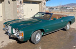1972 Mercury Cougar XR7 Convertible in green, featuring a ginger interior and newly upholstered seats.