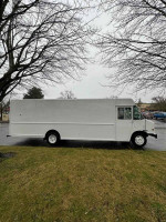 2018 Ford F59 FedEx step van with shelves in excellent condition, parked in Portland, Oregon.