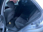 Interior view of a 2005 Honda Accord LX showing back seats and spacious cabin.