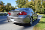 2009 Infiniti G37 Sport Sedan with sleek design parked in a lush outdoor setting