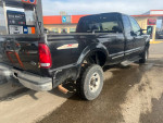 1999 Ford F-350 Super Duty pickup truck with open doors, 4x4 V10 engine for sale, cash asking price $2,600.