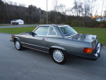 1989 Mercedes-Benz 560SL in pristine condition with anthracite gray paint and burgundy leather interior
