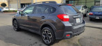 2013 Subaru Crosstrek parked, featuring a clean title, 5-speed manual transmission, and good tires.