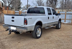 2000 Ford F250 Super Duty 4x4 with 267,000 miles, featuring a clean title and upgraded parts for heavy towing.