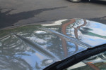 Close-up view of the glossy roof of a well-maintained 1986 Chevrolet Corvette.