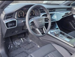 Interior view of a 2019 Audi A7 showing modern dashboard and controls, ideal for luxury car enthusiasts.