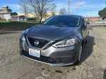 2017 Nissan Sentra in great condition, clean title, 126,000 miles, showcasing efficient fuel economy of 37+ MPG.