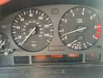Dashboard of a 2000 BMW 540i showing mileage and temperature, features clean and functional instruments.