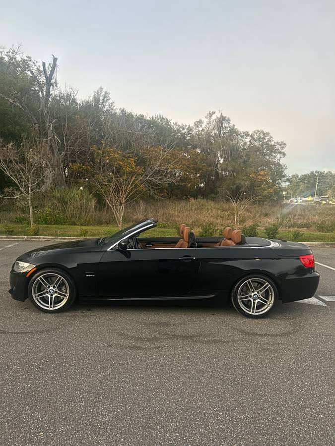 2011 BMW 335IS convertible with brown leather interior, in excellent condition and ready for sale.