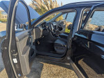 Interior view of a 2018 Volkswagen Tiguan with a black interior and modern features