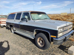 1991 Chevrolet Suburban 1500 in good condition, equipped with four-wheel drive and power features.
