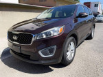2016 Kia Sorento L FWD with 137,000 miles, shown in front view, available for sale.
