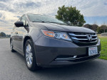 2014 Honda Odyssey EX FWD in Smokey Topaz color, excellent mechanical condition, low mileage of 54,000 miles.