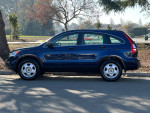 2011 Honda CR-V Sport SUV in blue, clean one-owner vehicle with 139,000 miles, parked on a sunny day.