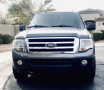 Front view of a 2014 Ford Expedition 4x4 in excellent condition, ideal for families and off-road adventures.