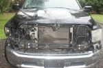 2017 Dodge Ram 1500 front view showing salvage condition, requires repair and inspection.