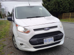 2018 Ford Transit Connect Cargo Van XL in white, suitable for cargo transport with rebuilt title.