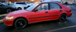 1993 Honda Civic DX sedan in red, well-maintained with new tires and manual transmission.