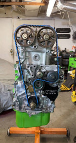 2000 Honda Prelude SH engine with adjustable cam gears and rebuilt head on a stand