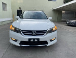 Front view of a 2015 Honda Accord EXL, white color, showcasing its sleek design and excellent condition.