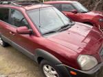 2005 Hyundai Tucson mini SUV for sale, 122,000 miles, red, 4WD, automatic with power features and heated seats.