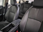 Interior of 2016 Honda Civic Touring with premium black leather seats and modern dashboard