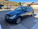 2007 Infiniti G35 sedan in excellent condition parked in a driveway with a clean exterior and good mileage.
