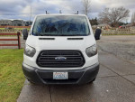Front view of a 2016 Ford Transit 250 Cargo Van with 86,000 miles, perfect for HVAC business and towing.