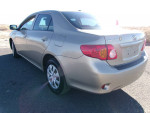 2009 Toyota Corolla LE in great condition, 83,000 miles, featuring a 1.8L engine and automatic transmission.