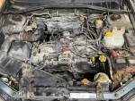 2002 Subaru Outback engine with manual transmission, regular maintenance & new all-season tires.
