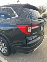 2019 Honda Pilot EX-L FWD SUV in excellent condition with low mileage, viewed from the rear.