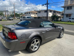 2003 Ford Mustang Cobra convertible in excellent condition with low mileage, showcasing its sleek design and garage-kept features.