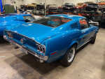 1968 Ford Mustang Fastback in Gulfstream Aqua Metallic with 63k original miles, showcased in a garage.