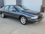 1996 Chevrolet Impala in excellent condition with gray leather seats and only 63,000 original miles