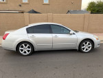 2004 Nissan Maxima for sale with low mileage and features like heated seats and moon roof.