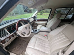 Interior view of a 2004 Lincoln Aviator with clean leather seats and a stylish dashboard