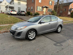 2011 Mazda 3 in excellent condition, automatic, with new brakes and tires, parked on a residential street.