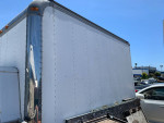 Used Chevy G30 moving van box truck exterior with reflective metal detail for sale and negotiable price.
