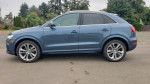 2017 Audi Q3 Quattro SUV in blue, showcasing its stylish design and excellent condition with 67,000 miles.