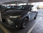 2023 Lexus NX 350h AWD parked in a garage with a sleek design and modern features.