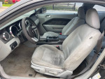 Interior view of a 2008 Ford Mustang showing clean seats and dashboard with a functional layout.