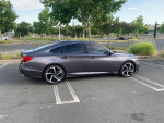 2018 Honda Accord Sport FWD in gray parked with clean title, featuring stylish design and modern tech.
