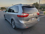 2020 Toyota Sienna XLE minivan in silver, showcasing modern design and features for sale with 89,000 miles.