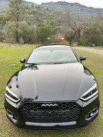 Front view of a 2018 Audi A5 Prestige quattro AWD in excellent condition.