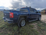 2014 GMC Sierra 1500 SLT 4WD in cobalt blue with leather interior, available for sale with low mileage.