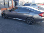 2019 Honda Civic Sport grey 4-door car for sale, salvage title, features air conditioning and Bluetooth