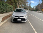2017 Toyota Corolla L in excellent condition, parked on the street, featuring new tires and modern safety features.